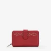 Femme Bosanova Portefeuilles | Portefeuille rouge moyen avec clous, fermeture éclair et bouton.
